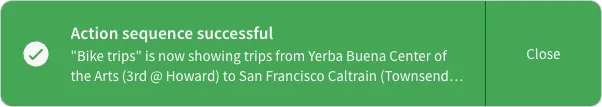 A success alert titled “Action sequence successful” confirms that the workbook now shows trips between selected stations. The message is truncated with an ellipsis, and a Close button is visible.