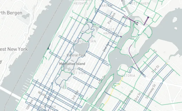 Geography map showing street-level detail of Manhattan with blue line overlays representing geospatial data.